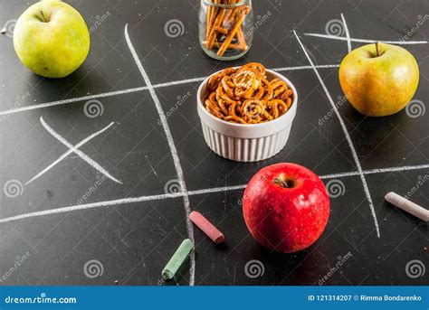 Tic Tac Toe Healthy And Unhealthy Snack Concept With Crackers C Stock