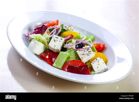 Traditional Greek salad with spices Stock Photo - Alamy