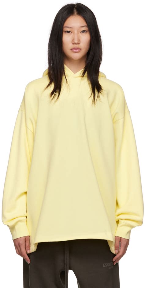 Yellow Relaxed Hoodie by Fear of God ESSENTIALS on Sale