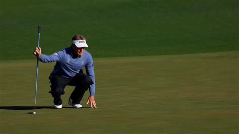 Masters Champion Bernhard Langer Of Germany Lines Up A Putt On The No