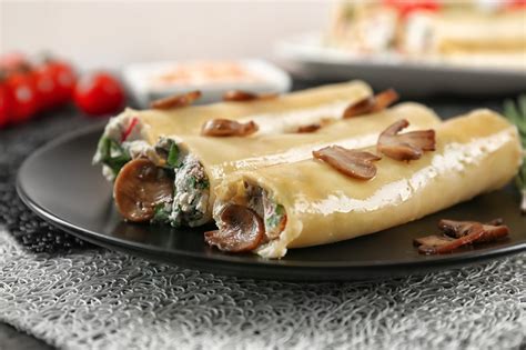 Come Fare I Cannelloni Ricotta E Funghi Deabyday