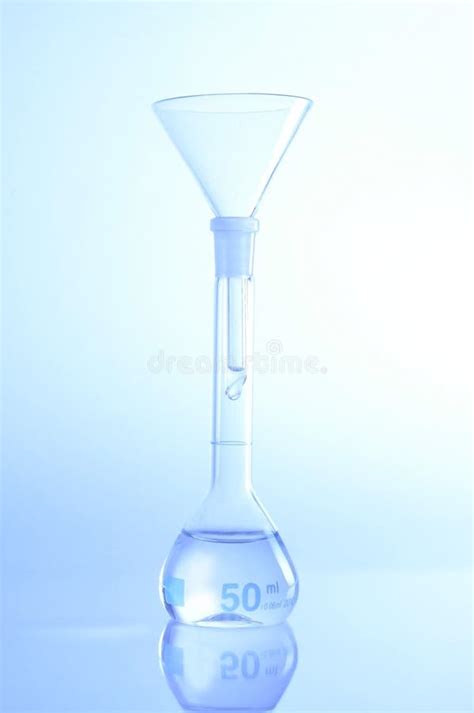 Glass Funnel and Volumetric Flask Stock Photo - Image of analysis ...