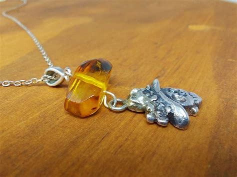 Pin on Amber necklace