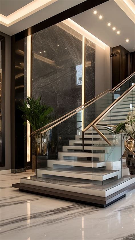 An Elegant Staircase With Marble Steps Leading To The Upper Floor And