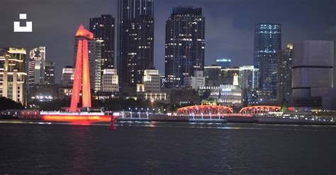 A city skyline at night photo – Free China Image on Unsplash