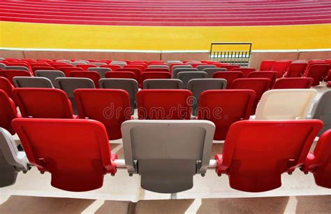 Seating Area Detail of Sport Stadium. Curving Rows of Colorful Plastic Seats on Steel Frame ...