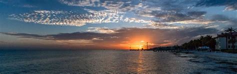 Key West sunset from Higgs Beach. #Higgsbeachkeywest #whitestreetpier #ultimatekeywestbeachguide ...