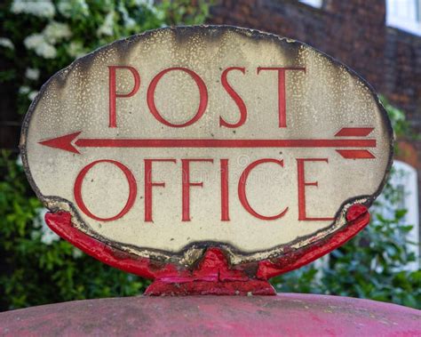 Viintage Post Office Sign on a Red Post Box in London, UK Stock Image ...