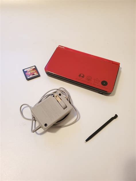 Nintendo DSi XL Super Mario 25th Anniversary Edition Red Handheld With