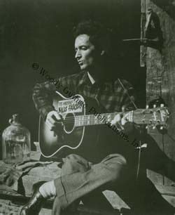 Woody Guthrie Plays One Of His Famous This Machine Kills Fascists