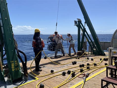 Carol Kim Left Makes Sure That The Umbilical Tether Between The Ship