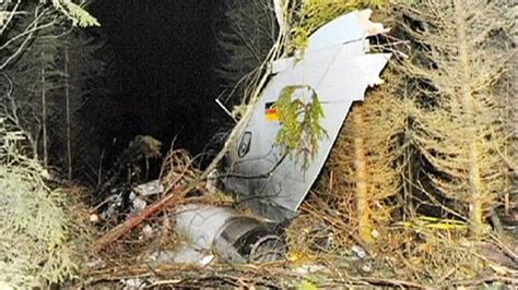 German Tornado attack plane crashes. Pilot rescued from tree branches ...