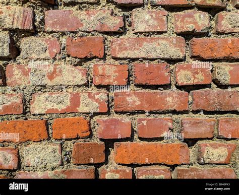 Creepy brick wall of an old warehouse Stock Photo - Alamy