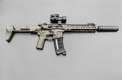 Ar15 Honey Badger Sbr With Aimpoint Red Dot And With A Suppressor