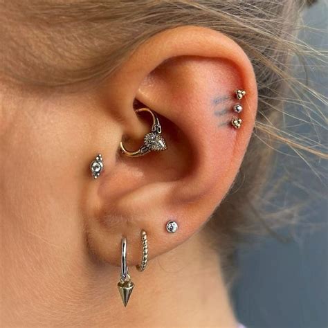 Ear Curation Textures In 2023 Pretty Ear Piercings Body Piercing