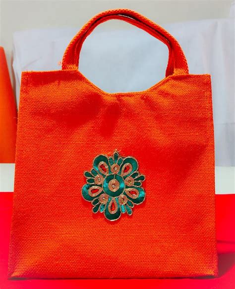 Embroidery Handled Orange Jute Gift Bag Capacity 4kg Size Dimension