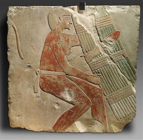 Relief Of A Man Carrying A Papyrus Bundle Middle Kingdom Life In