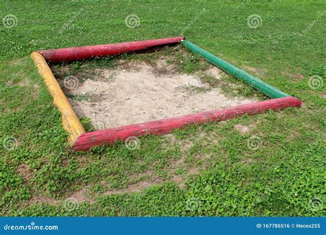 Improvised Vintage Retro Colorful Wooden Sandbox Made From Four Wooden