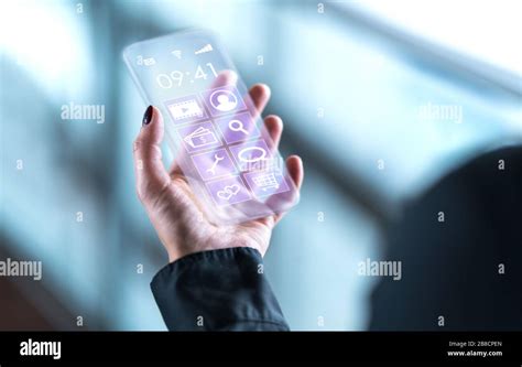 Transparent mobile phone. Futuristic glass smartphone. Cellphone with future digital technology ...