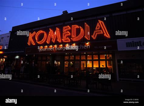 The neon sign for the Komedia Comedy Club in Brighton Stock Photo - Alamy