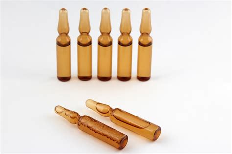 Premium Photo Seven Medical Glass Ampoules For Injection Drug