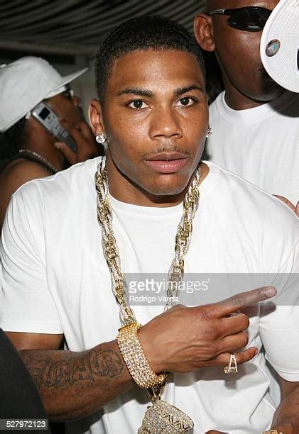 Nelly Hosts Memorial Day Pool Party Photos And Premium High Res