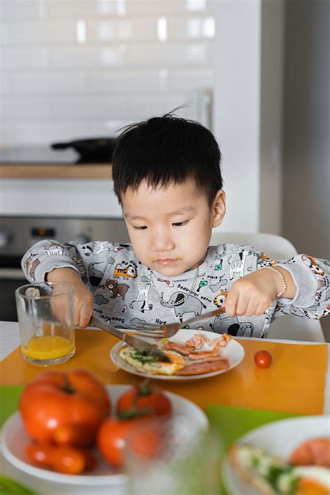 Boy Eating a Pizza · Free Stock Photo