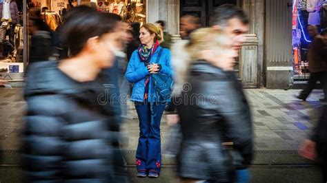 Woman Standing Alone Among Crowd Of People In Istanbul City Life