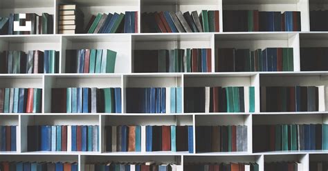 White and blue wooden book shelves photo – Free Library Image on Unsplash