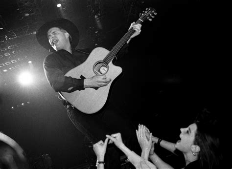 Garth Brooks - Singing and Playing on Stage, England, 1990 Print ...