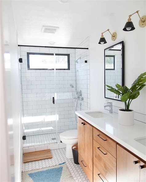 White Bathroom remodel with natural wood floating vanity, colorful rug ...