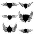 Set Of Emblems With Wings Isolated On White Vector Image