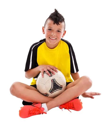 Boy sitting on soccer ball Stock Photos, Royalty Free Boy sitting on soccer ball Images ...