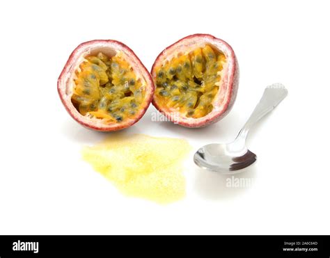 Passion Fruit Cut In Half With Juicy Pulp And Seeds Ready To Eat With