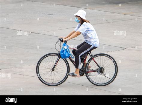 Samut Prakan Thailand Apr A Woman Rides A Bicycle On The