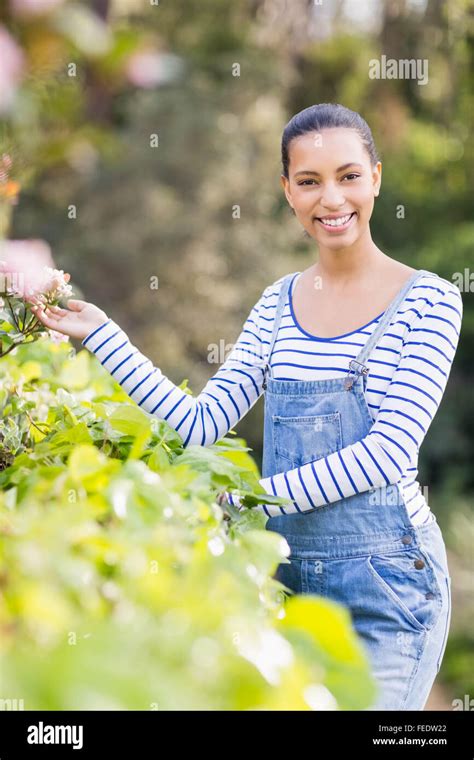 Happy Brunette Gardening Stock Photo Alamy