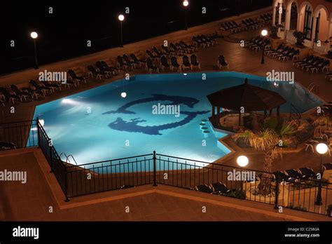 hotel swimming pool on the island of malta Stock Photo - Alamy