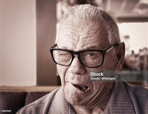 Senior Man Winking Stock Photo Download Image Now Making A Face