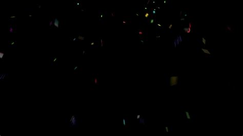 Colorful confetti explodes on a black background 27665248 Stock Video at Vecteezy