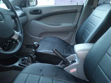 Подлокотник — Chevrolet Lacetti 5D, 1,4 л, 2011 года | аксессуары | DRIVE2