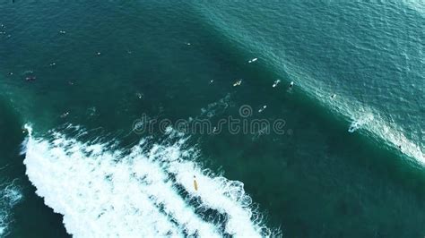 Amazing Aerial View Top Down Of Waves Break On Tropical Sea Surfers