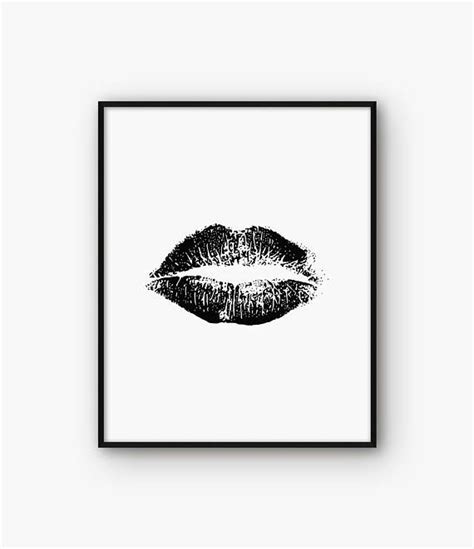 A Black And White Print With The Shape Of A Kiss On Its Lips