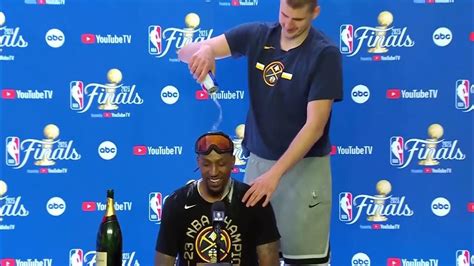 Moment Nikola Jokic Pours Beer On Kentavious Caldwell Pope During