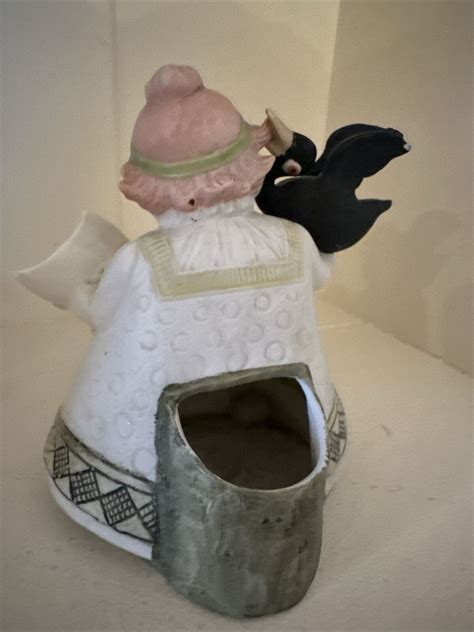 Funny Pottery Ceramic Fat Lady Holding Newly Hatched Crow Marking On