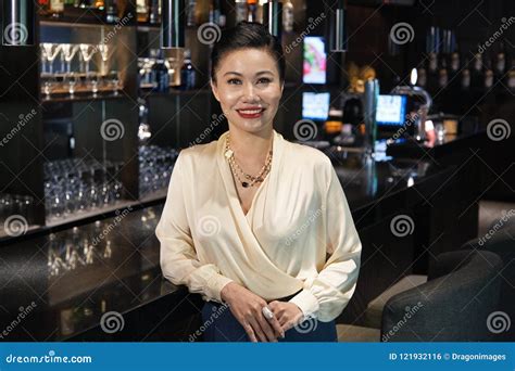 Smiling Businesswoman Leaning On Bar Counter Stock Photo Image Of