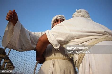 Mandaeans, also known as Sabeans, take part in a religious ritual on ...