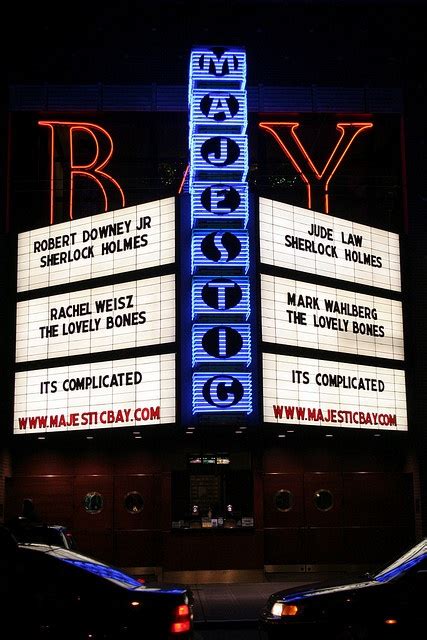 the marquee for broadway is lit up at night