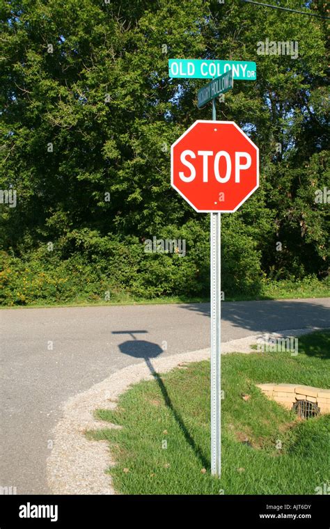 Stop Sign And Street Sign At Intersection Usa Stock Photo Alamy