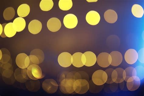 Premium Photo Abstract Bokeh Background Golden Bokeh Circles On Dark