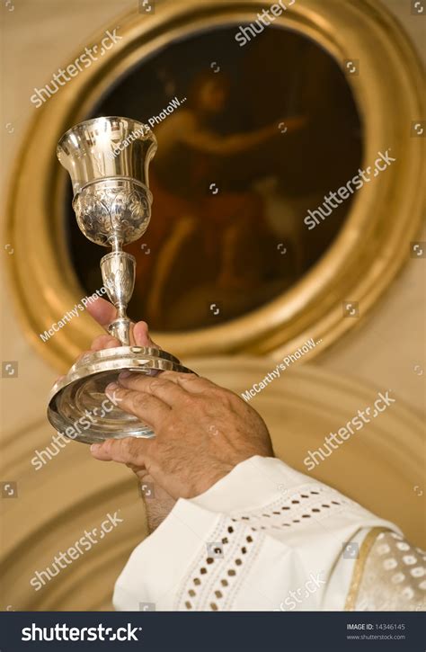 Priests Hands During Mass Raising Chalice Stock Photo Edit Now 14346145